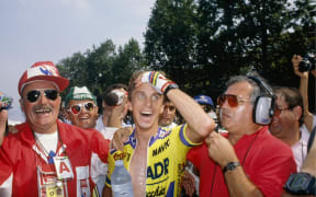American cyclist Greg LeMond celebrating victory in the 1989 Tour De France beating Laurent Fignon on the final day to record the narrowest victory in Tour history.