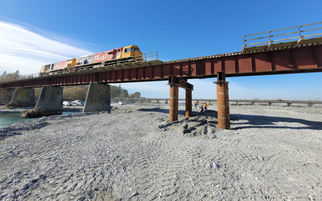 A train crossing the Rangitata Rail Bridge on 25 April, 2024, during testing following repairs made after flooding washed away a pier and left the bridge sagging.