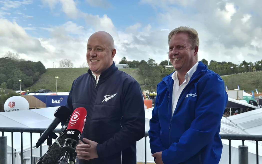 Prime Minister Christopher Luxon and minister Todd McClay speak to reporters at Fieldays, 2025.