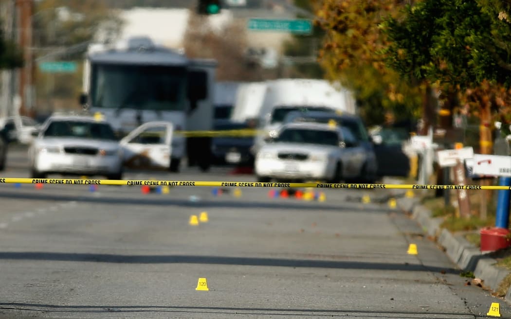 Evidence markers line San Bernadino Avenue where suspects of the Inland Regional Center were killed.
December 3, 2015 California.