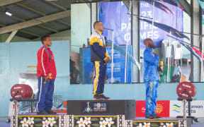 Nauru’s Mahaasin Daoe, middle, won gold in the men’s 66kg. Photos: Peter Kofana, Pacific Games News Service