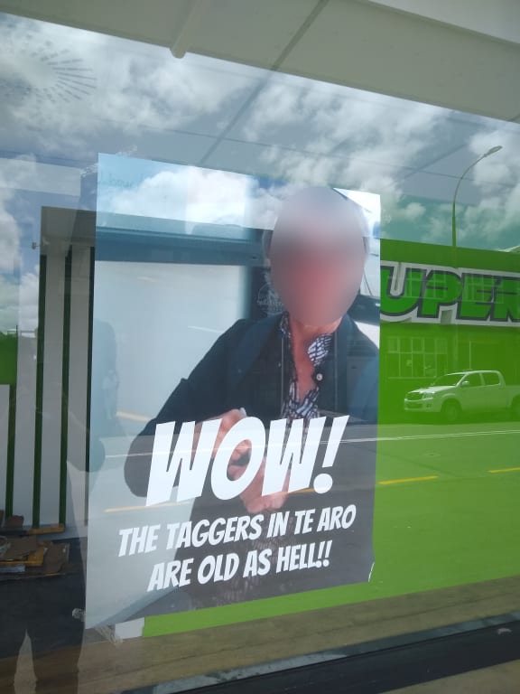 Superloans display an edited photo featuring a woman who vandalised their storefront.