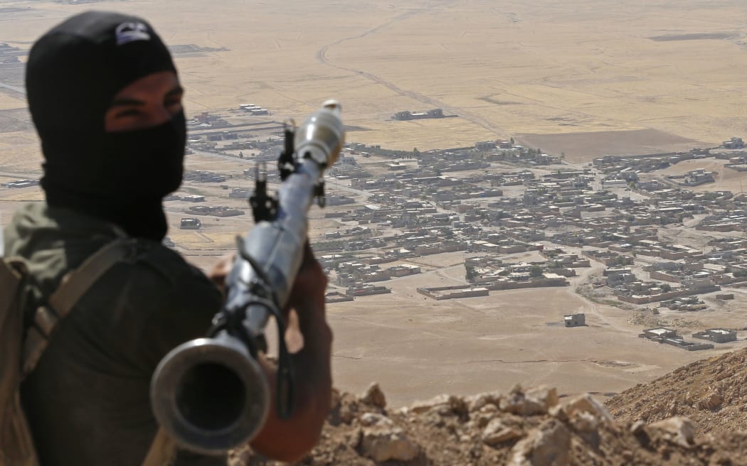 Kurdish Peshmerga fighters are attacking Islamic State positions near Mosul, Iraq.