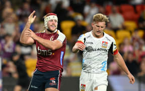 Fraser McReight (left) of the Reds celebrates scoring a try during the Super Rugby Pacific Round 3 match between the Queensland Reds and the Chiefs at Suncorp Stadium in Brisbane, Saturday, March 9, 2024. (AAP Image/Darren England / www.photosport.nz)