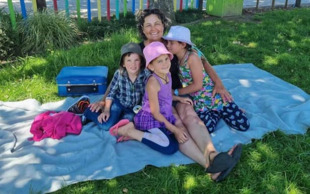 A photo posted on social media by Cat of her and her three missing children during a visit to the park in November 2021 before they were taken by their father, Tom Phillips.
