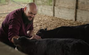 Journalist Baz Macdonald in a scene from the TVNZ documentary series Milk and Money