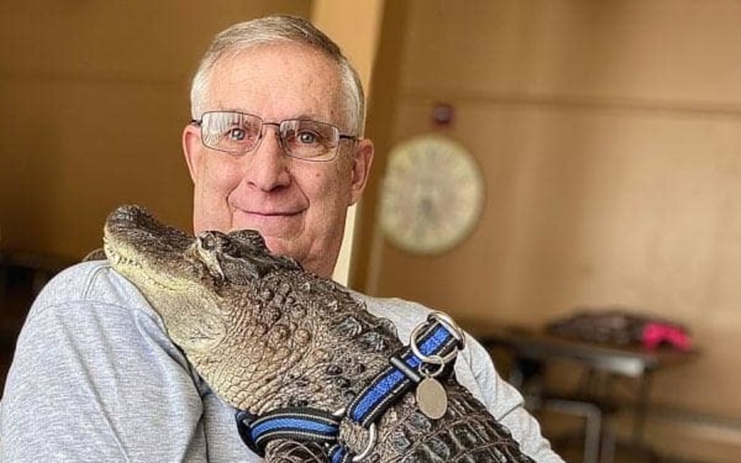 He does a lot of cuddling Alligator offers owner emotional
