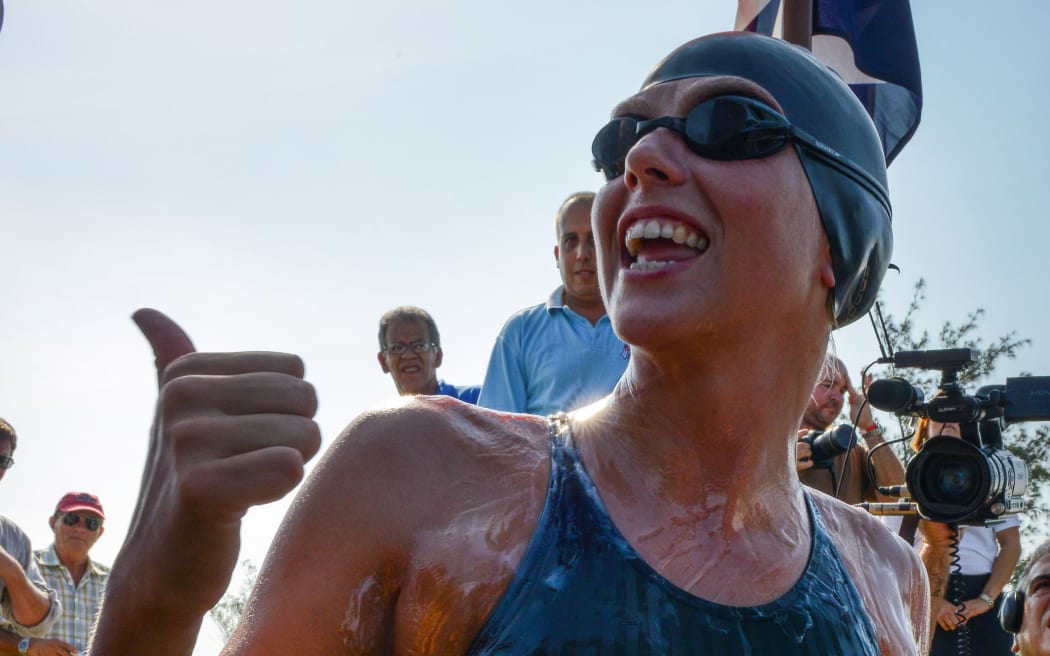 Australian swimmer Chloe McCardel gives her thumb up before her departure from Marina Hemingway in Havana, on June 12, 2013.