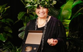 Mary Ama with her Museum Medal.