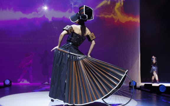 Wanton Widow by Kate MacKenzie of New Zealand is modelled in the Open Section during the 2022 World of WearableArt Preview Show at TSB Bank Arena
