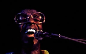 Sylvester Stewart plays at Woodstock, 1970.