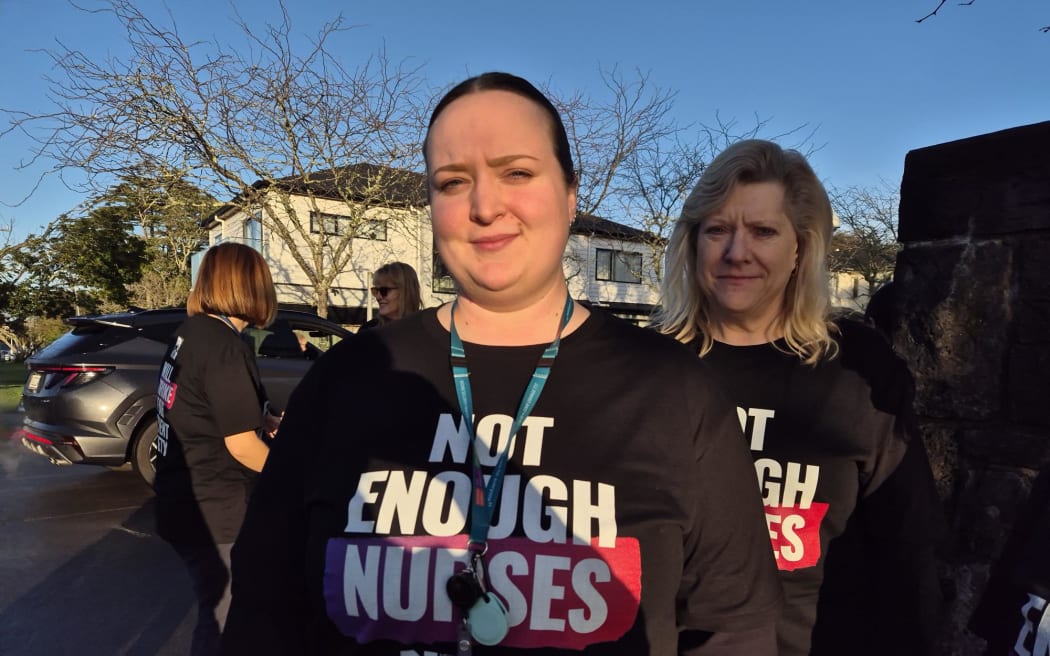 District nurses on Auckland's North Shore wear t-shirts saying 'Not Enough Nurses' as part of industrial action over staffing levels.