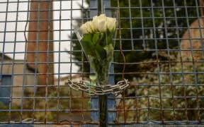 Flowers left at the gate entrance to the former site of Sisters of Charity Magdalene Laundry in Donnybrook, Dublin