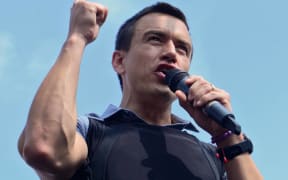 (FILES) Ecuadorean presidential candidate Daniel Noboa, of the National Democratic Action Party, delivers a speech during a campaign rally in Guayaquil, Ecuador, on October 9, 2023. Ecuador's new President Daniel Noboa announced on January 4, 2024, the construction of two new maximum security prisons in the country, where violence linked to drug trafficking and gang wars has exploded in recent years. He said the buildings would be exactly the same as a prison built by El Salvador President Nayib Bukele, who has led a controversial crackdown on gangs in his Central American country. (Photo by Gerardo MENOSCAL / AFP)