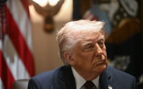 US President Donald Trump looks on during a cabinet meeting in the Cabinet Room of the White House on 24 March, 2025, in Washington, DC.