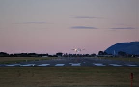 Air NZ Q300 landing Nelson Airport, from where the company is shifting its heavy maintenance base.