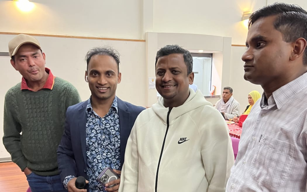 Rashid Ansorali (second from left) and 3 other attendees at the Burmese Rohingya Welfare Organisation Eid celebration