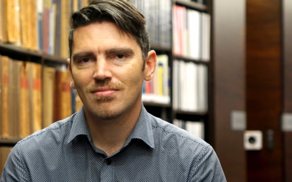 Shaun Higgins, the museum's pictorial curator.