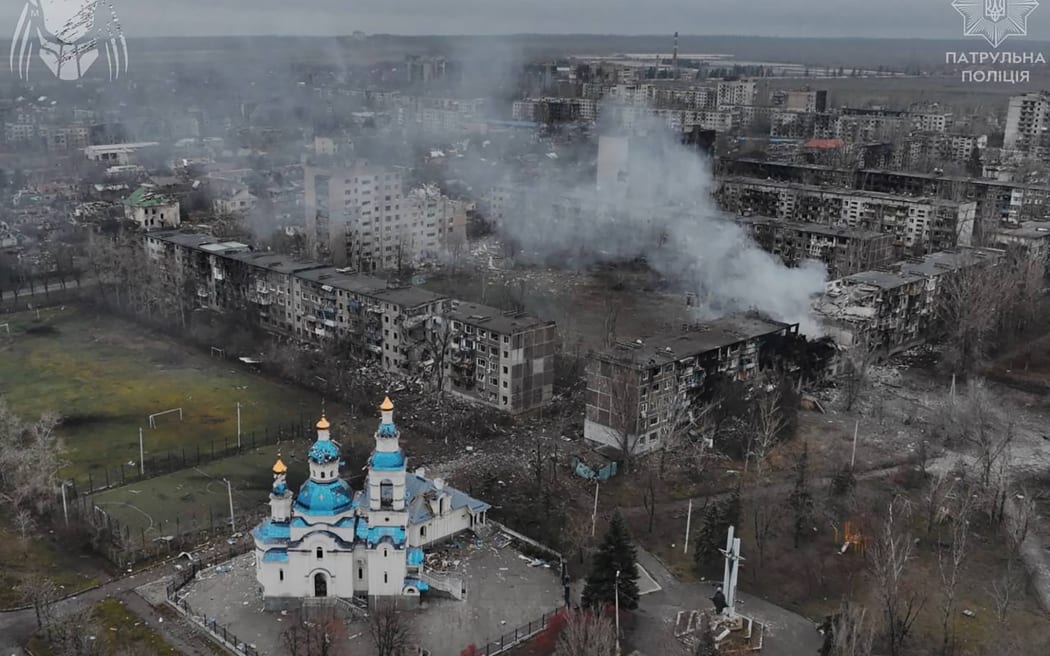 This undated handout photograph released by the National Police of Ukraine on December 12, 2025 shows an aerial view of heavily damaged residential buildings and a church in the frontline town of Kostyantynivka, Donetsk region, amid the Russian invasion of Ukraine. (Photo by Handout / National Police of Ukraine / AFP) / RESTRICTED TO EDITORIAL USE - MANDATORY CREDIT "AFP PHOTO / NATIONAL POLICE OF UKRAINE" - NO MARKETING NO ADVERTISING CAMPAIGNS - DISTRIBUTED AS A SERVICE TO CLIENTS