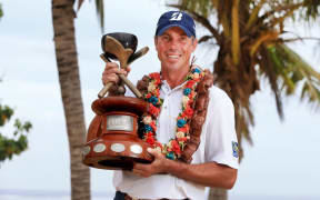 Matt Kuchar with the Fiji International trophy.