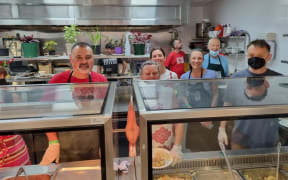 Kitchen volunteers at the Auckland City Mission this morning.
