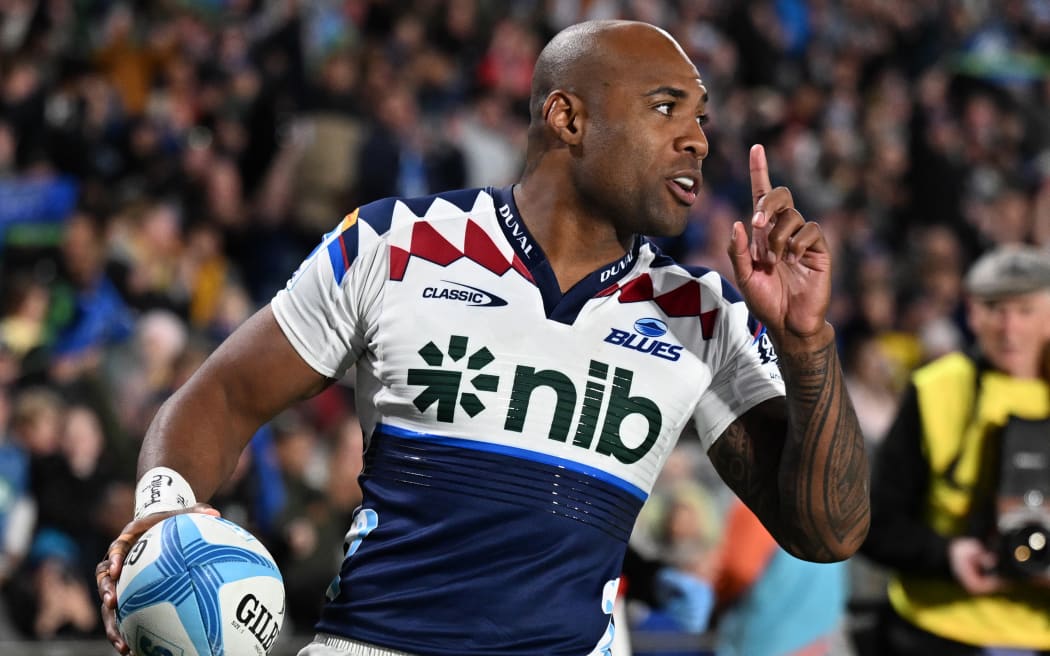 Mark Tele'a celebrates his try against the Hurricanes in round 12 of the Super Rugby Pacific competition at Eden Park.