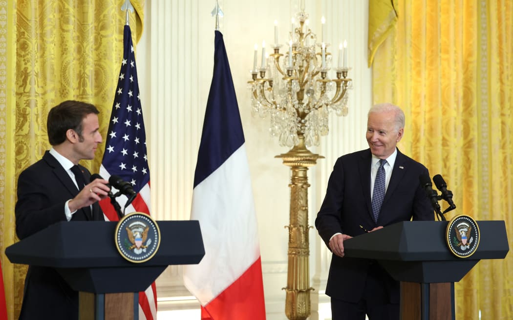 US President Joe Biden and French President Emmanuel Macron hold a joint press conference at the White House during an official state visit on December 01, 2022 in Washington, DC.