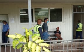 52-year old Italian citizen and captain of the yacht MV Badu, Carlos Attansio. heads to court in Papua New Guinea, charged with smuggling drugs, 11 August 2020 .