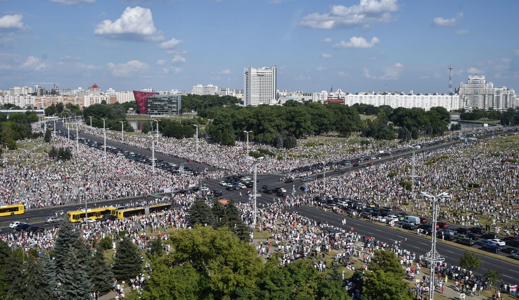 Belarus opposition supporters attend a rally in central Minsk on August 16, 2020.