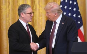 US President Donald Trump holds a press conference with British Prime Minister Keir Starmer in the East Room of the White House in Washington, DC, on February 27, 2025. Starmer is meeting Trump to plead for a US backstop to any Ukraine ceasefire, insisting it would be the only way to stop Russia's Vladimir Putin from invading again. Starmer arrived in Washington late Wednesday to build on a visit by French President Emmanuel Macron, amid growing concerns in Europe that the US leader is about to sell Kyiv short in negotiations with Putin. (Photo by SAUL LOEB / AFP)