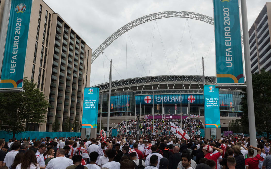 LONDON, UNITED KINGDOM - JULY 11, 2021: England football fans arrive at Wembley Stadium ahead of England match against Italy in the final of Euro 2020 Championship on July 11, 2021 in London, England.
