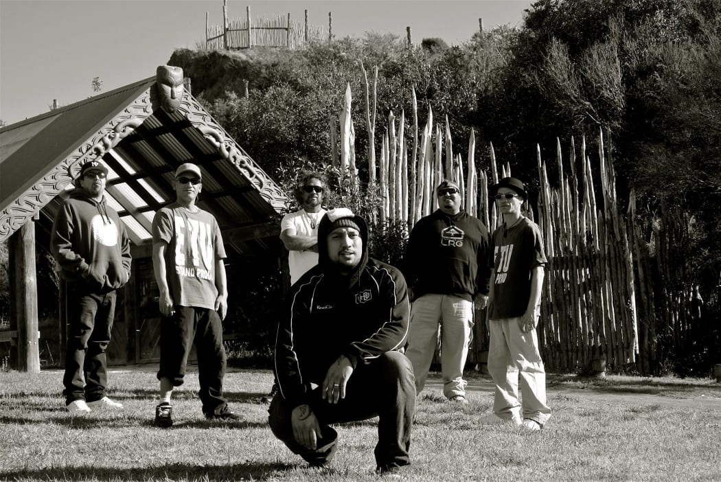 Tipene with members of Upper Hutt Posse, in the video for 'Pioneers'