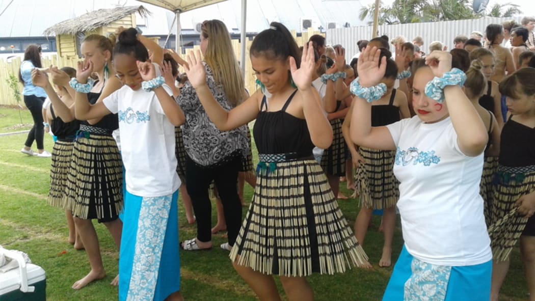 Students warm up for their performance at the Pasifika in the Bay Festival in the Bay of Plenty.