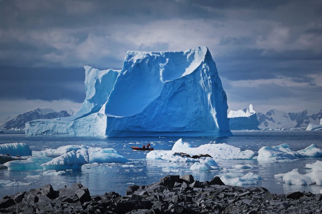Icebergs grounded near Adelaide Island, Antarctica Peninsula. The Antarctic Peninsula is one of the most rapidly warming parts of the continent. By the end of this century, Antarctica could contribute up to 40 centimetres to sea level rise.