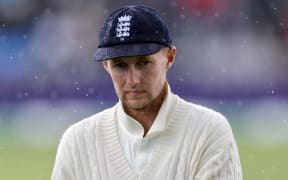 Captain Joe Root walks off in the rain just before play is abandoned for the day in the 4th Ashes Test Match between England and Australia at Old Trafford, Manchester on 4th September 2019.
Copyright photo: Graham Morris / www.photosport.nz