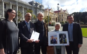 A petition over Ashley Peacock's care is presented to Parliament on 15 September 2016. Left to right: Kimberley Hall from Autism NZ, Kevin Hague, Ashley's parents Dave and Marlene, Grant Robertson