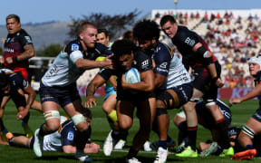 Leicester  Fainga'anuku of the Crusaders in the tackle of Charlie Cale of the Brumbies and Rob Valetini of the Brumbies during the Super Rugby Pacific match - Crusaders Vs Brumbies at the Apollo Projects Stadium, New Zealand, 22nd February 2026. Copyright photo: John Davidson / www.photosport.nz
