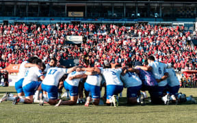 Manu Samoa team bows in prayer after their 31-12 loss to Chile on Sunday morning. Photo: Manu Samoa