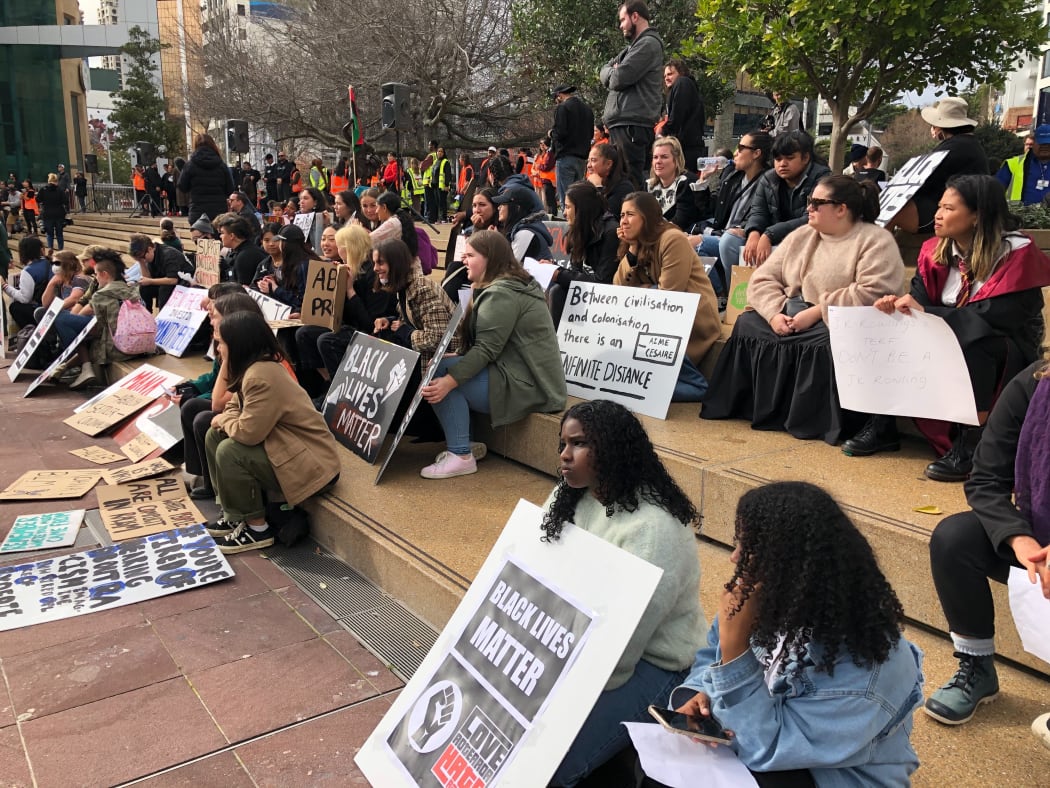 Protesters wait for the start of the Black Lives Matter rally in Aotea Square in Auckland.