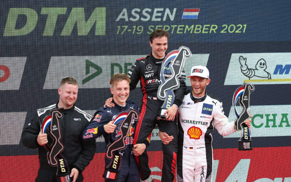 Liam Lawson (second left) after finishing second in race two of the DTM weekend in Assen, Netherlands, Sunday 19th of September 2021.