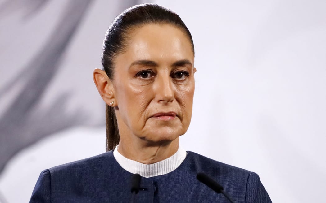 Mexican President Claudia Sheinbaum Pardo speaks about the murder of the mayor of Uruapan, Carlos Manzo Rodriguez, during a press conference at the National Palace in Mexico City, Mexico, on November 3, 2025. (Photo by Luis Barron/Eyepix Group/NurPhoto) (Photo by Eyepix / NurPhoto via AFP)