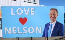 Nelson mayor Nick Smith is ready to amalgamate with his next door mayor, Tim King. King is not so keen.