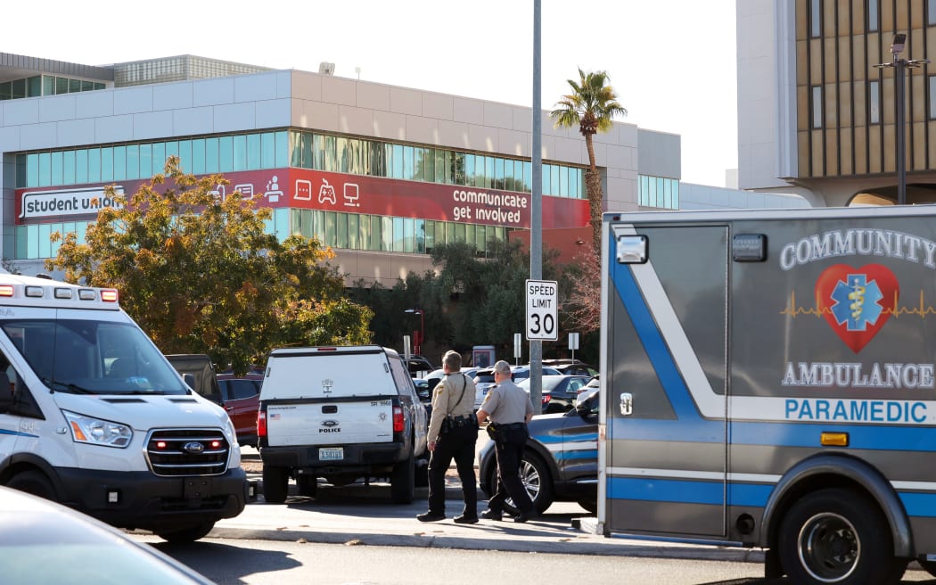 Emergency crews and law enforcement respond to a shooting at the University of Nevada, Las Vegas, campus in Las Vegas on December 6, 2023.
