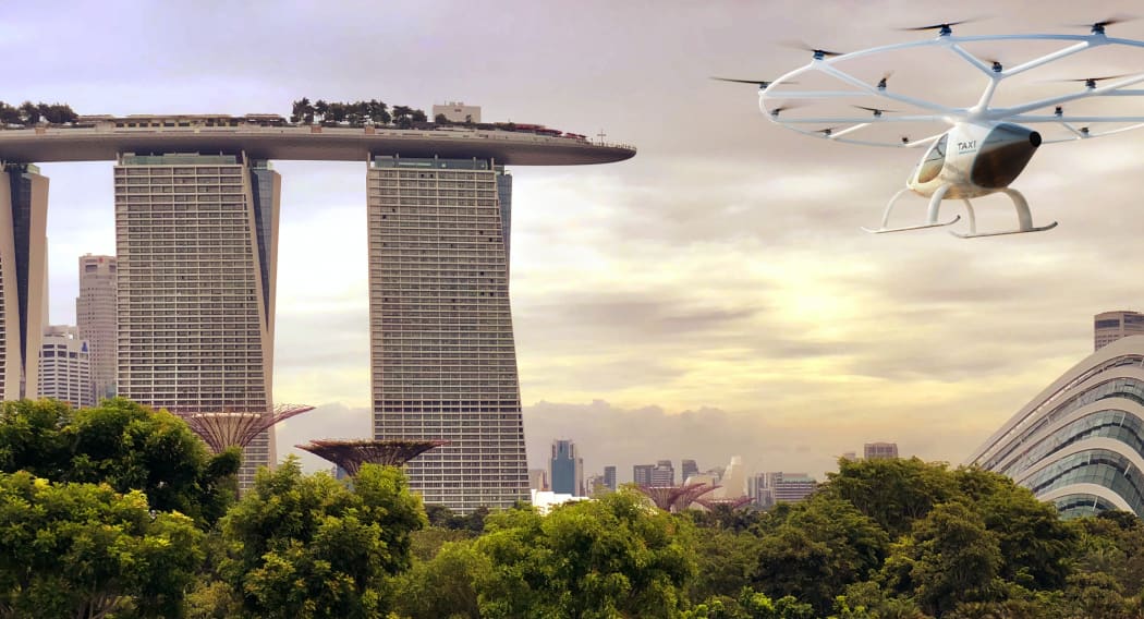 An illustration showing an air taxi heading towards Singapore's Marina Bay Sands.