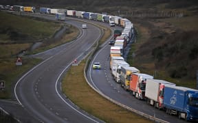 The Dover Traffic Access Protocol (TAP) scheme on the A20 is seen in action as freight lorries queue on the main route into the port of Dover on the south coast of England on December 17, 2020.