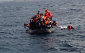 Refugees are rescued off the Turkish coast on 4 January, 2016.