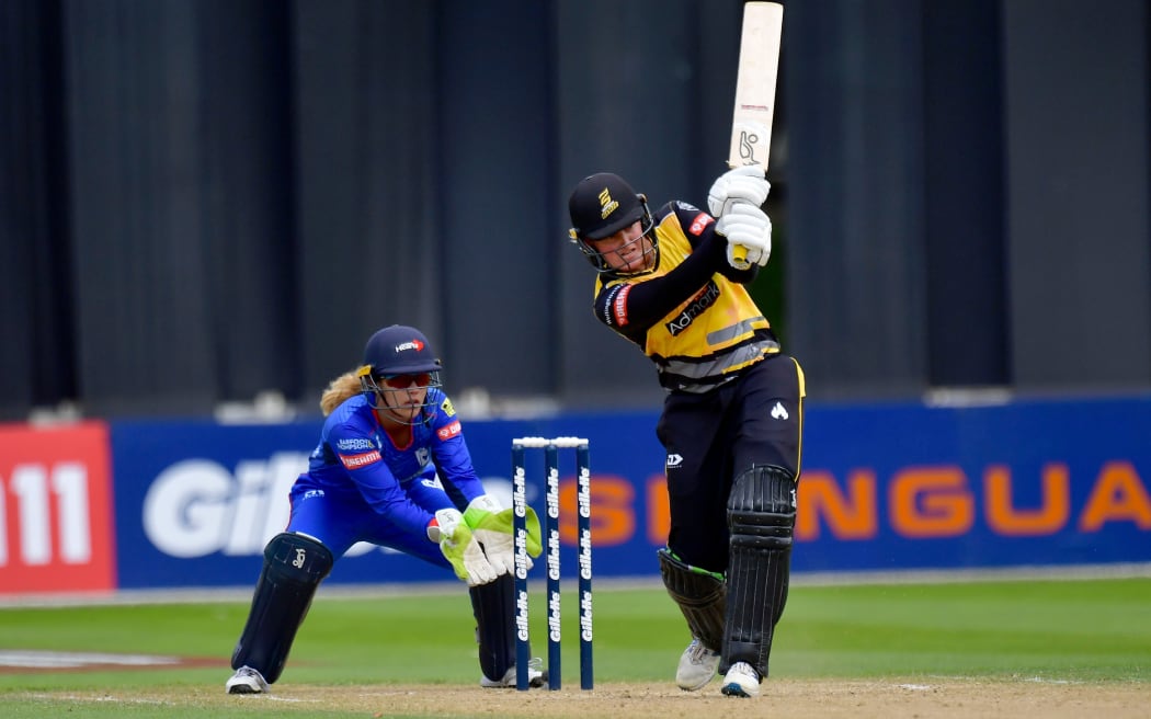 Blaze's Liz Green-Perry (R plays a shot with Hearts' wicket-keeper Natasha van Tilburg during the Super Smash cricket match between the Wellington Blaze and Auckland Hearts at the Basin Reserve on Sunday the 12th of January 2020.