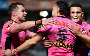 Penrith players celebrate a try.