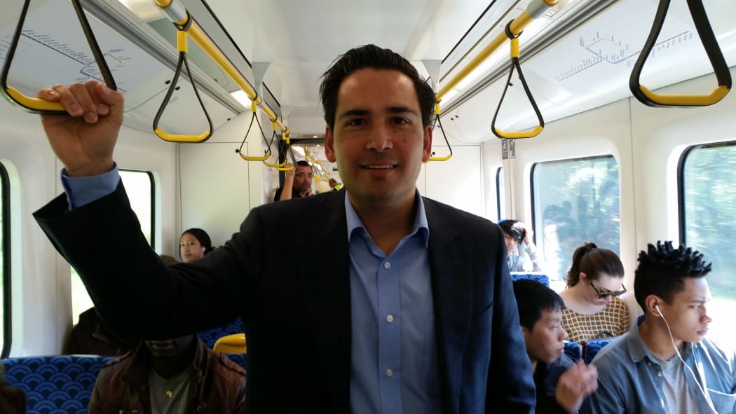 Transport Minister Simon Bridges on an Auckland train.