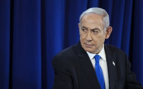 Israeli Prime Minister Benjamin Netanyahu addresses a press conference in Tel Aviv on July 13, 2024 amid the ongoing conflict between Israel and the Palestinian militant Hamas group in Gaza. (Photo by Nir Elias / POOL / AFP)